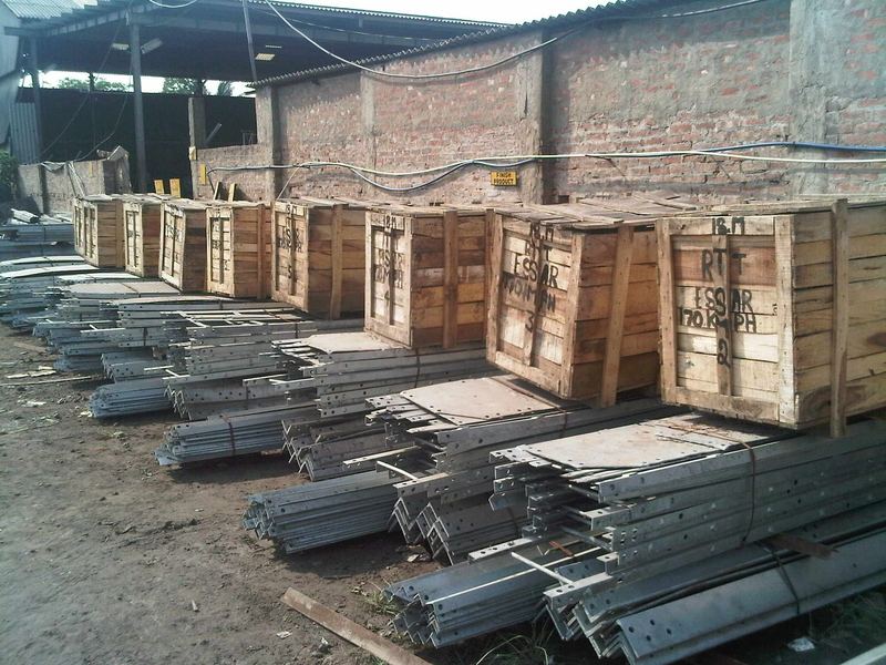 Crates and loose members in the yard. Crated and loose consignments in the despatch yard, marked up by order before loading.