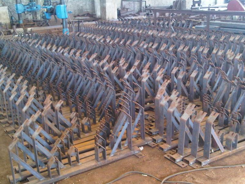 Fabricated frames in the shop. A run of fabricated frames laid out in the shop before galvanizing. Volume work is set out in rows so the count and the mark numbers can be...