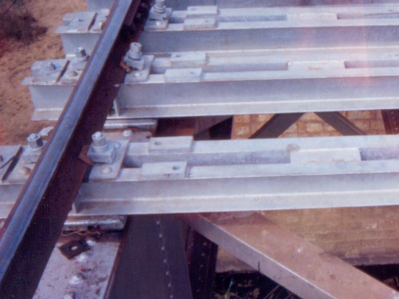 Steel channel sleepers on a bridge deck. Galvanized steel channel sleepers bolted through to the girder on a bridge deck. We have manufactured steel channel sleepers for Indian...
